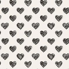 black and white hearts drawn in pencil on a light background seamless wallpaper pattern