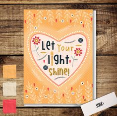 a card with the words let your light shine on it next to some crafting supplies