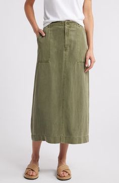 Rock utilitarian vibes in this any-day maxi skirt crafted from a lightweight linen-kissed blend. Zip fly with button closure 65% Tencel® lyocell, 22% cotton, 13% linen Tencel lyocell is a more-sustainably produced fiber made with closed-loop processing Machine wash, tumble dry Imported Wabi Sabi Style Clothes, Travel Skirt, Chic Dressing, Utility Skirt, Utilitarian Style, Dressing Style, Skirt Trends, Closet Inspiration, Winter Skirt