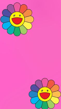 two colorful flowers on a pink background with one flower smiling and the other has an open mouth