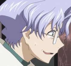 a man with purple hair and glasses staring at something