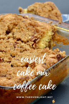 a close up of a cake in a pan with the words easy cake mix coffee cake