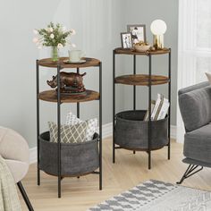 a living room filled with furniture next to a couch and table on top of a hard wood floor