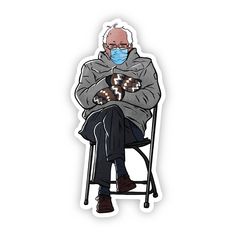 an old man sitting on a chair wearing a face mask