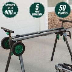 two green wheels are attached to the back of a cart with four different parts labeled on it