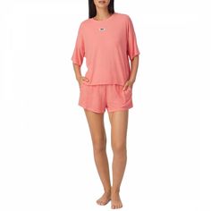 Relaxed fit round neck pyjama top with logo detailing.The boxer pyjama shorts finished with an elastic waist with logo detailing and two side pockets.Colour: PinkComposition: 61% RAYON 31% POLYAMIDE 8% SPANDEX Pajama Shorts