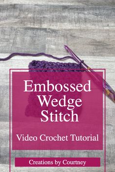 the crochet video guide for embossed wedge stitch is displayed on a wooden surface