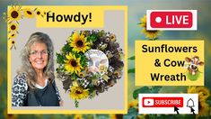 the sunflowers and cow wreath is on display in front of a live sign