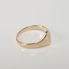 "Thanks for shopping our vintage estate store. We tend to sell well below wholesale and truly hope you enjoy all of our items. Many of the items are one of a kind, so please enjoy scrolling through the pictures and hopefully something will catch your eye. Black spots are from the camera. Estate 14k yellow gold monogram letter B Infant baby or midi ring. Ring size: 1 Setting: 1/4\" 6.5mm Band width: 1.5mm Weight: .72 gram Beautiful ring, just waiting for someone to wear it. Marked 14k." Classic Gold Engraved Oval Ring, Classic Gold Signet Ring With Hallmarks, Classic Gold Signet Ring, Everyday Oval Initial Ring Stamped 14k, Antique Personalized Yellow Gold Signet Ring, Yellow Gold Engraved Ring Stamped 14k For Everyday, Gold Oval Signet Ring With Hallmarks, Personalized Antique Yellow Gold Signet Ring, Yellow Gold Signet Ring With Hallmarks