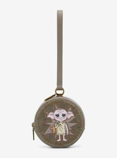 Bring your favorite House Elf on all your adventures with this Harry Potter coin purse! Featuring an embroidered applique of Dobby  the front of this purse also includes velvet details and a studded border. With a zipper closure  wristlet strap  and a lobster clasp  this coin purse is the perfect accessory for Hogsmeade. Don't forget the other matching coin purses sold separately!A BoxLunch Exclusive!PolyurethaneApprox. 5" W x 5" H x 2 34" DImported Harry Potter Coins, Hogwarts Decor, Harry Potter Dobby, House Elf, Dobby Harry Potter, Tee Bag, Embroidered Portrait, Harry Potter Houses, Elf House