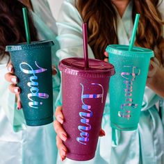 three girls are holding colorful tumblers with straws in their hands and one has a name on it