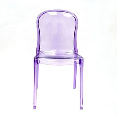 a purple plastic chair sitting on top of a white floor