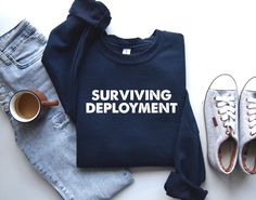 Surviving Deployment, Military Girlfriend, Army Wife, Army Wife Sweatshirt, Army Wife Military Shirt,  Navy Wife Shirt, Gift for Army Wife. PRODUCTION TIME: 1-3 days (Typically within 2 days) SHIPPING TIME: 2-5 days (Typically 3 days) PRODUCT DESCRIPTION: The Gildan UNISEX Sweatshirt (18000) and Hoodie (18500) are crafted from high-quality materials. The Gildan Heavy Blend garment offers an impeccable fit and a plush, comfortable feel.  CARE INSTRUCTIONS: - Machine wash: warm (maximum 40C or 105F) - Use non-chlorine bleach as needed - Tumble dry: medium heat - Do not iron - Do not dry clean WE CARE ABOUT YOU AND THE ENVIRONMENT: - Our print chemicals are certified by "REACH" and "Oeko-Tex® Standard 100 Class I". (Oeko-Tex Standard 100 is a worldwide certification for textiles such as yarns Military Girlfriend Army, Surviving Deployment, Army Girlfriend Shirts, Deployment Countdown, Navy Wife Life, Wife Sweatshirt, Army Wife Life, Navy Girlfriend, Secret Sister