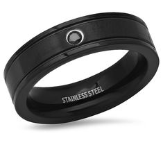 Elevate your style with this black cubic zirconia ring, a bold statement of sophistication and strength. Its sleek black ion-plated stainless steel band, accented with a flush-set black cubic zirconia, offers a modern twist on classic elegance. Perfect for any occasion, this ring is a testament to the confident man who wears it. From Steel by Design® Jewelry. Confident Man, Cubic Zirconia Rings, Design Jewelry, Stainless Steel Band, Classic Elegance, Elevate Your Style, Cubic Zirconia, Jewelry Design, Twist