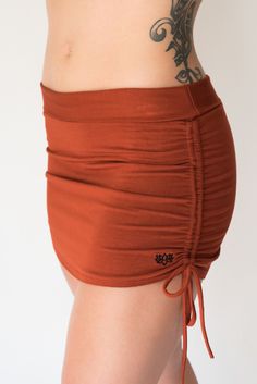 Our softest silkiest skirt, made from eco friendly rayon mixed with spandex, its super stretchy and form fits to your body's shape. Can be worn long, or cinch up the sides to make it shorter and tighter around your bum. Leave the top tall, or fold it over to customize fit. Available in one size only, designed to be adjustable, fits most S/M. See sizing guide for more info. Cinch Skirt, Hippy Skirt, Tribe Clothing, Summer Mini Skirt, Yoga Skirt, Club Skirts, Yoga Photos, Hippie Skirts, Festival Skirts