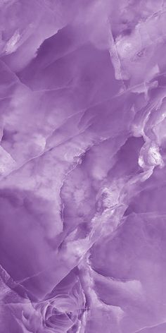 an abstract photo of purple and white paper