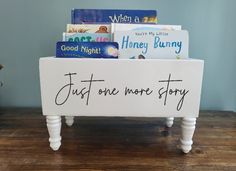 a book stand with books on it that says read me a story