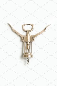 Wine bottle opener on a white Wine White, House Essentials, Wine Bottle Opener, Wine Opener, Bottle Openers, Technical Drawing, Wine Gifts, Grimm, A White Background