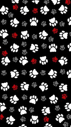 a black background with white and red paw prints on it's sides, including hearts