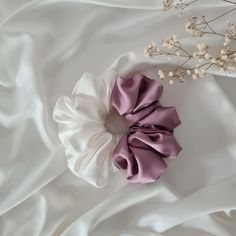 Discover the elegance of our Hot Pink Satin Hair Scrunchie. Made from high-quality satin, this handmade scrunchie is designed to be gentle on your hair, preventing breakage and reducing tangles. The bright mauve and ivory hue will make a vibrant statement in any hairstyle, making it an essential accessory for your collection. Features: * Material: High-quality silk satin * Color: Mauve and ivory * Size: Large, perfect for all hair types * Handmade: Crafted with care * Benefits: Prevents hair dam Cut Hairstyles, Handmade Scrunchie, Medium Cut, Daily Hairstyles, Silk Hair, Satin Color, Hair Game, Brides And Bridesmaids, Pink Satin