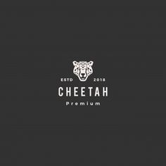 the cheetah premium logo is shown on a dark background with white letters and an animal