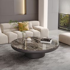 a modern living room with marble coffee table