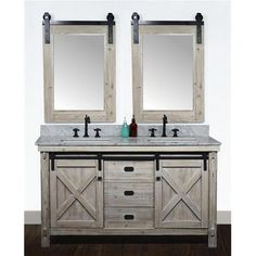 two mirrors are above the double sink vanity