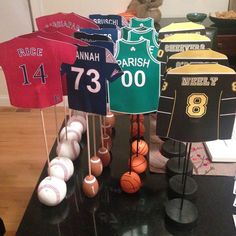 there are many different sports jerseys on display