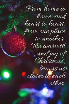 a christmas ornament hanging from a tree with the words, home and heart to heart