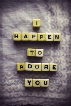 scrabble tiles spelling i happen to adore you