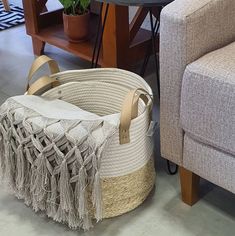 a living room filled with furniture next to a table and chair in front of a couch