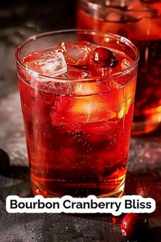 bourbon cranberry bliss cocktail with ice and cherries