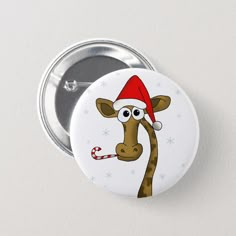 a button with a cartoon giraffe wearing a santa hat and holding a candy cane