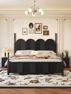 a bedroom with a bed, dressers and pictures on the wall above it's headboard