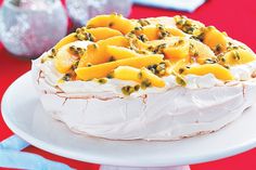 there is a cake that has been decorated with pineapples and other toppings