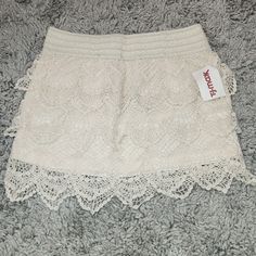 Nabee Crochet Style Skirt Size Medium Nwt! 13in Long Casual Lace Skirt For Beach, Summer Casual Lace Mini Skirt, Casual Lace Mini Skirt For Summer, Spring Mini Skirt With Crochet Trim, Spring Lace Skirt With Crochet Trim, Lace Skirt With Crochet Trim, Casual Stretch Lace Skirt, Fitted Lace Skirt With Crochet Trim, Spring Mini Skirt With Crochet Details