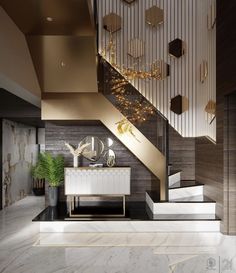 an elegant staircase with gold and white accents