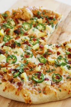 a pizza sitting on top of a wooden cutting board