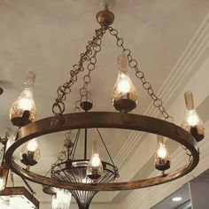 a chandelier hanging from the ceiling in a room