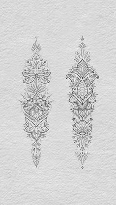 two ornate designs on white paper