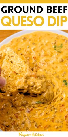 a hand dipping a tortilla chip into a bowl of ground beef queso dip