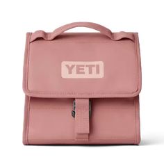 a pink bag with the word yet on it and a strap around the front pocket