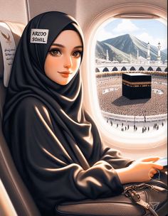 a woman sitting in an airplane seat looking out the window at a ka'bah