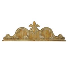 a wooden shelf with an ornate design on the top and bottom, against a white background