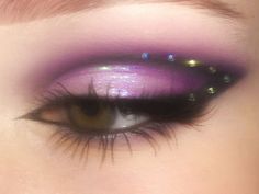 Purple Makeup Looks Euphoria, Purple Glitter Hair, Purple Makeup Eyeshadow, Space Makeup Aesthetic, Lavender Makeup Aesthetic, Iridescent Makeup Looks Prom, Purple Makeup Looks With Rhinestones, Purple Star Makeup, Purple Glam Makeup Looks