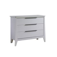 a white dresser with three drawers on it