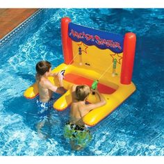 two young boys playing in an inflatable pool