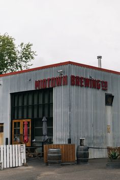 the outside of a building that has a sign on it saying, nottown brewing