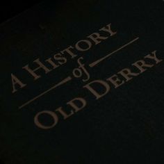 an old derby book sitting on top of a table