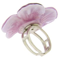 Throughout centuries, flowers have been symbols of delicate beauty and elegance, coveted gifts for fair ladies and beautiful home accents . Perhaps not surprisingly, it is in handcrafted glass flowers that one can best see the amazing skill and talent of Murano Glass artisans. This Murano Glass ring in the shape of a purple daisy was painstakingly crafted with incredible detail by glass artisans whose lineage goes back to the great Venetian masters of the centuries past. The purple glass of the Elegant Flower Shaped Ring For Gift, Elegant Flower Shaped Ring As Gift, Elegant Petal Shaped Flower Ring As Gift, Unique Glass Jewelry For Wedding, Adjustable Flower Ring For Formal Occasions, Adjustable Round Flower Ring For Formal Occasions, Elegant Petal Flower Ring Gift, Elegant Petal Shaped Rings For Gift, Handmade Elegant Flower Ring